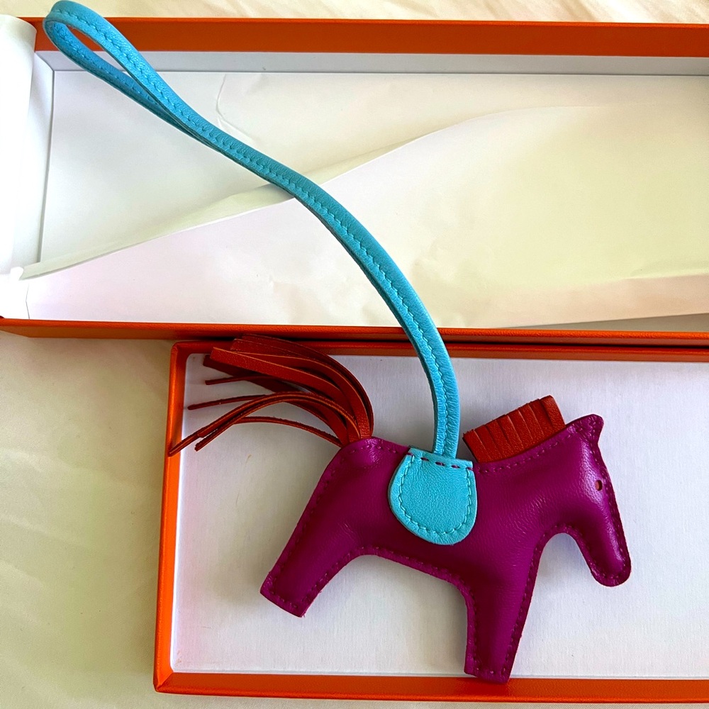 Hermes Milo Lambskin Rodeo PM Charm in Rose Purple, Celeste, and Cornelian